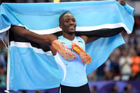 | Photo: AP/Matthias Schrader : Letsile Tebogo, of Botswana, celebrates after winning the men's 200-meter